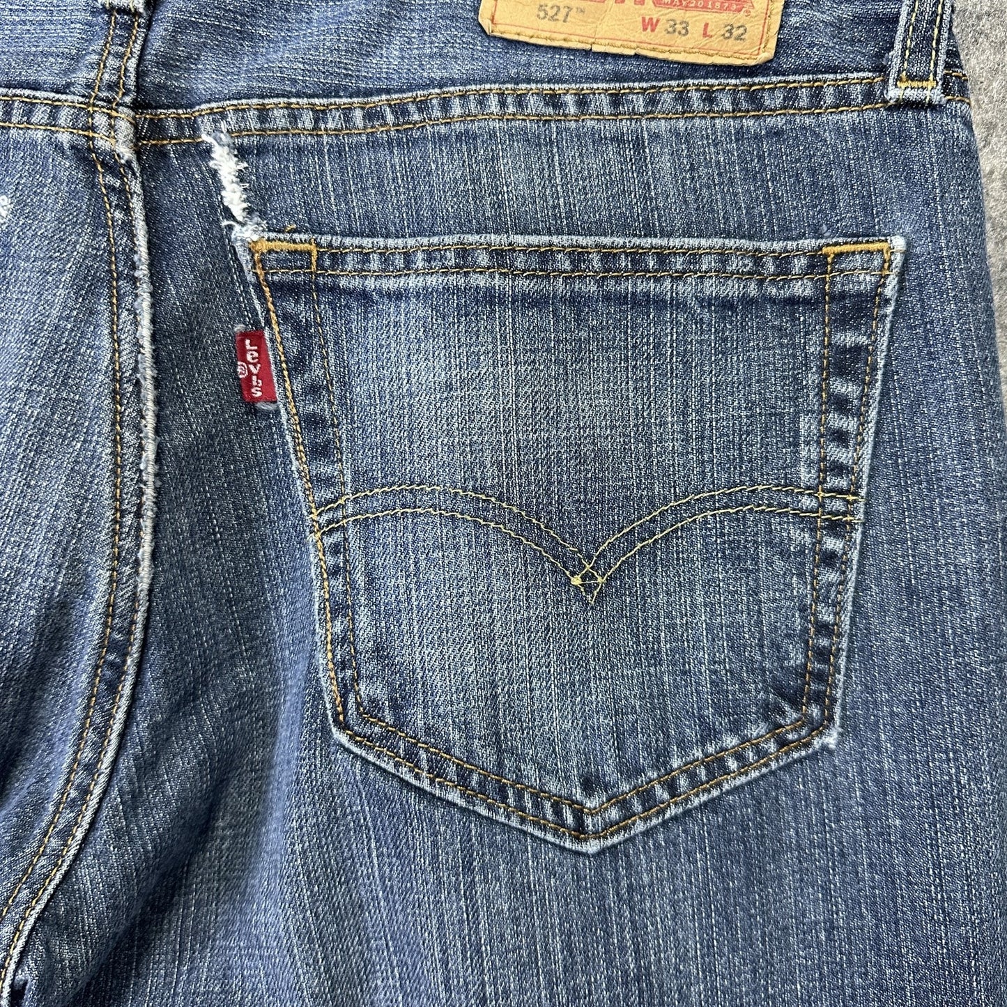 Levis 527 Jeans Mens 33x32 Blue Slim Bootcut Denim Waterless Distressed Rip - BNDL