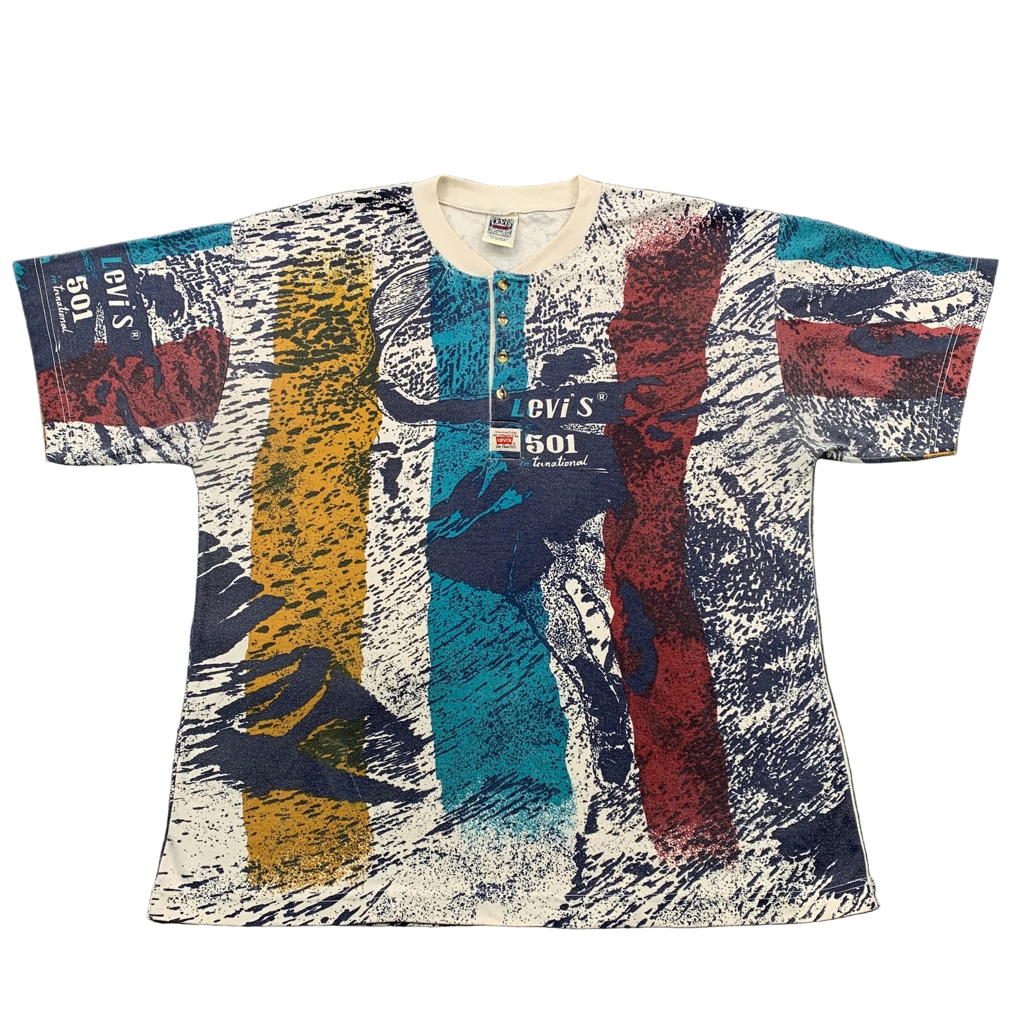 Colorful patterned t-shirt with Levi's branding on a gray surface