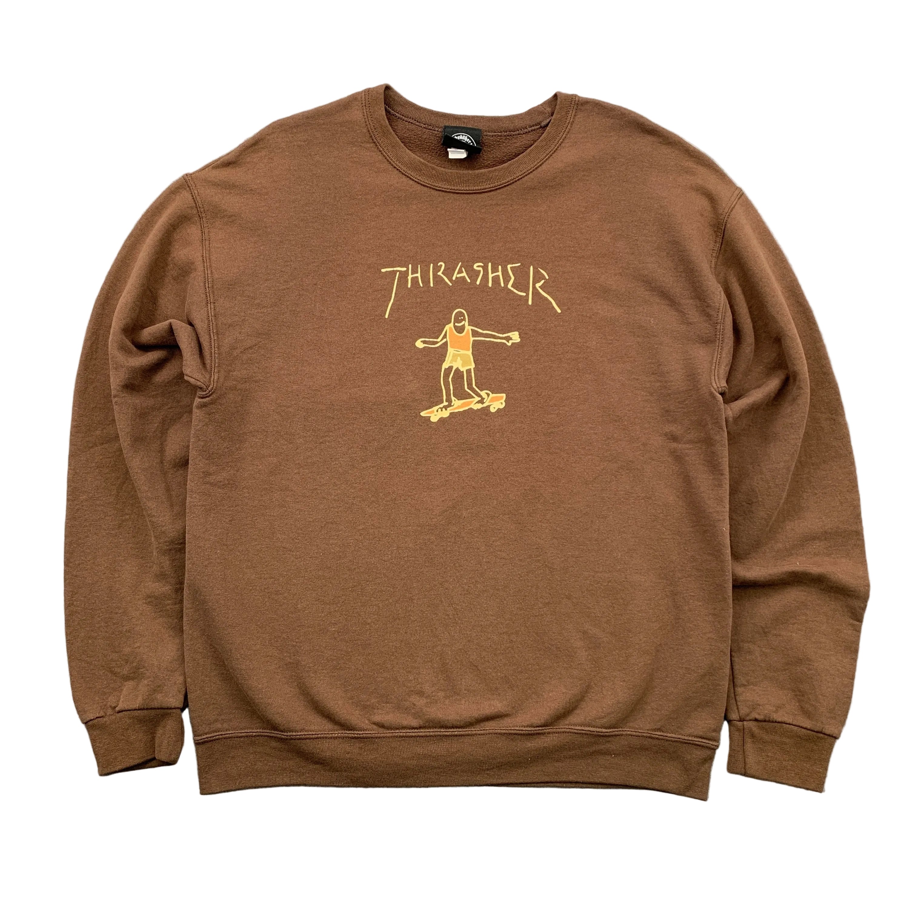 Brown sweatshirt with yellow graphic design on a gray background