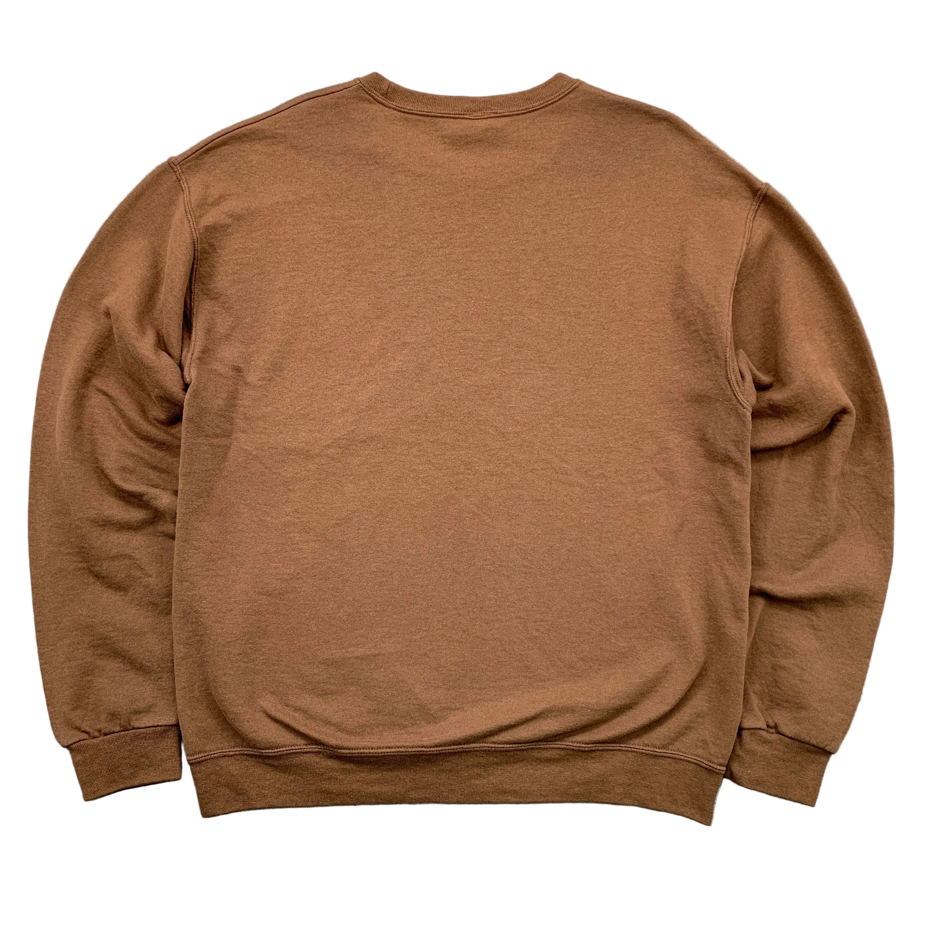 Brown sweatshirt on a gray textured background