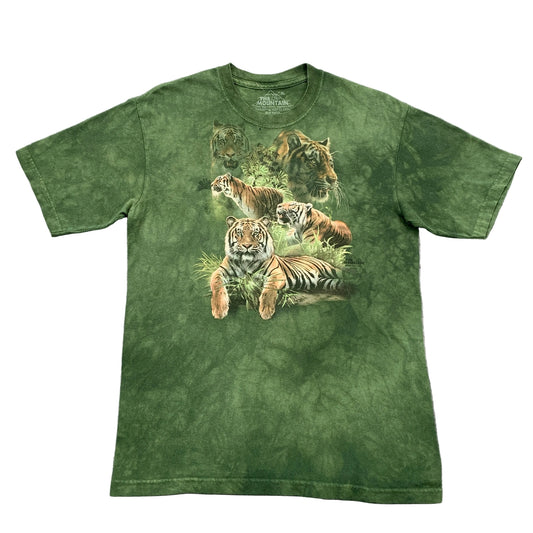 Green t-shirt with tiger design on a gray surface