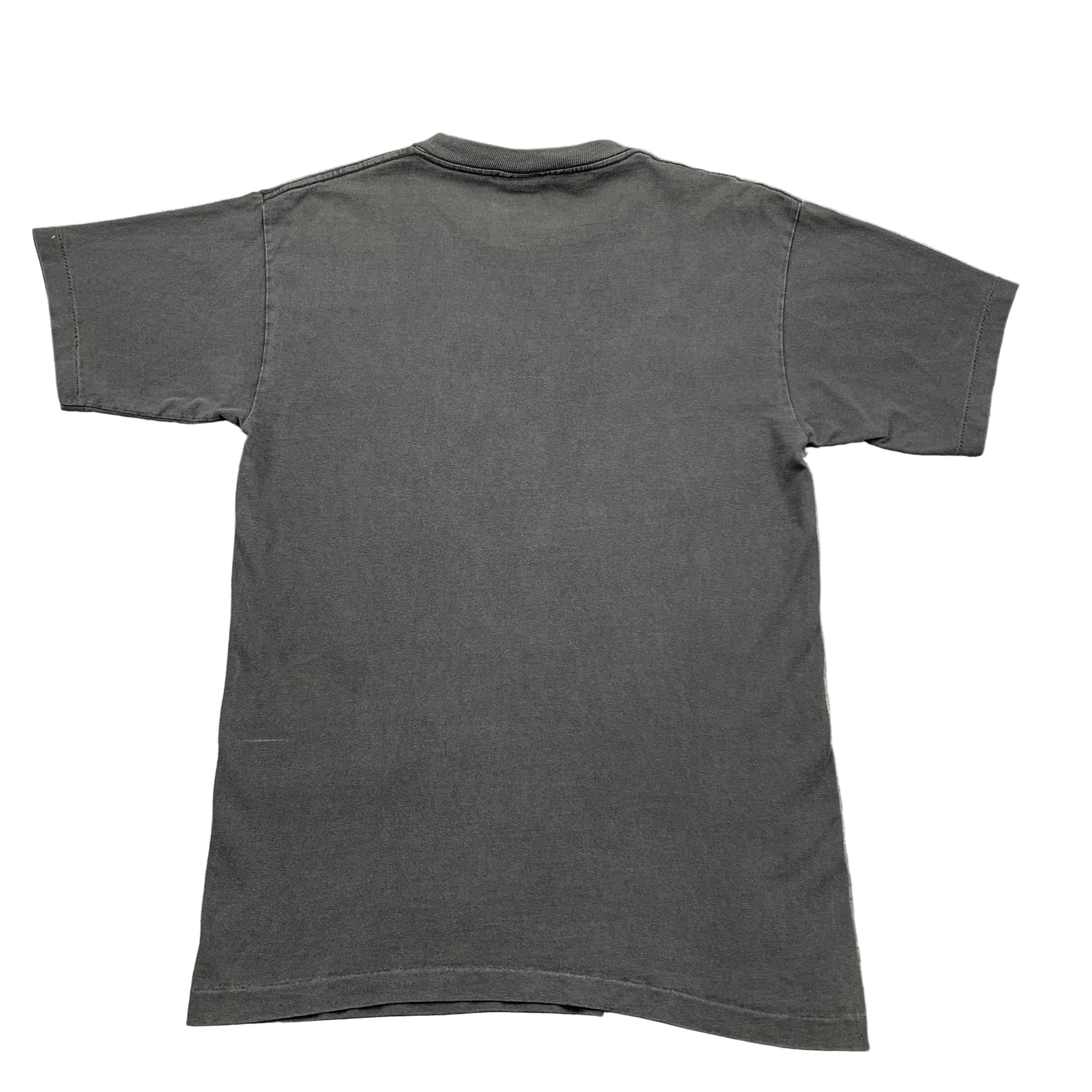 Gray t-shirt on a textured gray surface