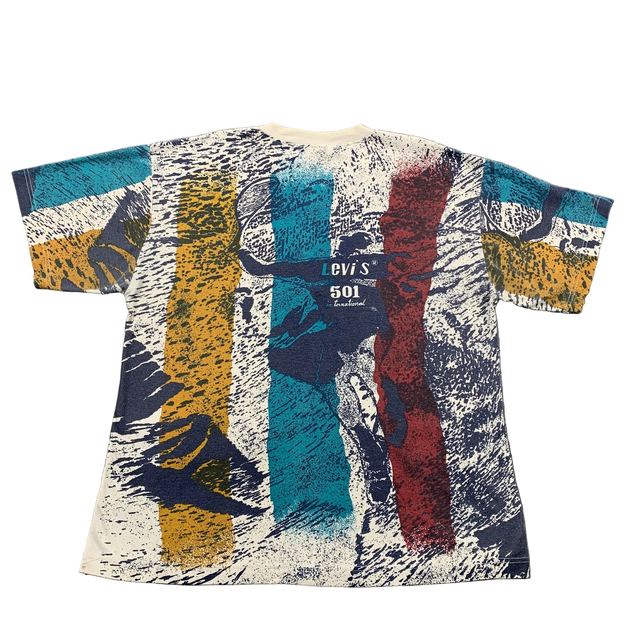 Colorful graphic t-shirt with Levi's branding on a gray surface