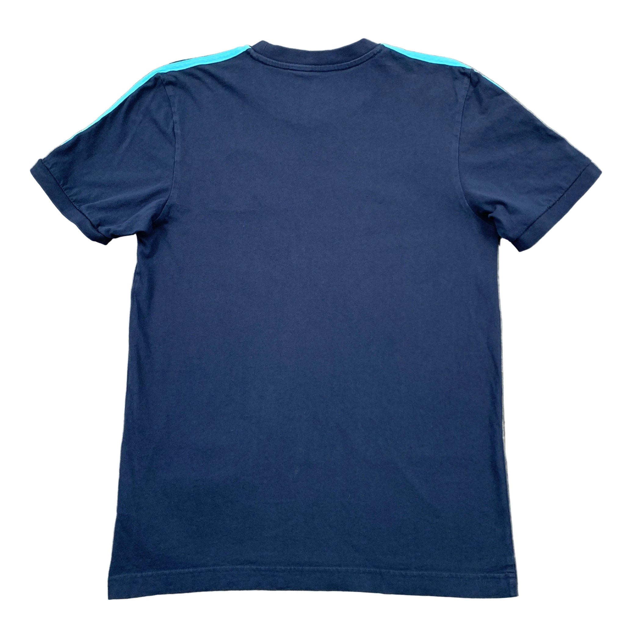 Navy blue t-shirt with a small light blue stripe on the shoulder against a gray background