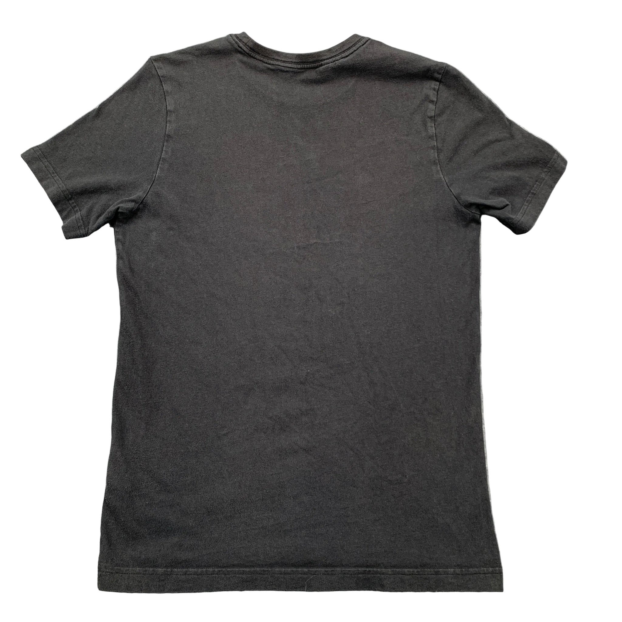 Black t-shirt on a gray textured surface