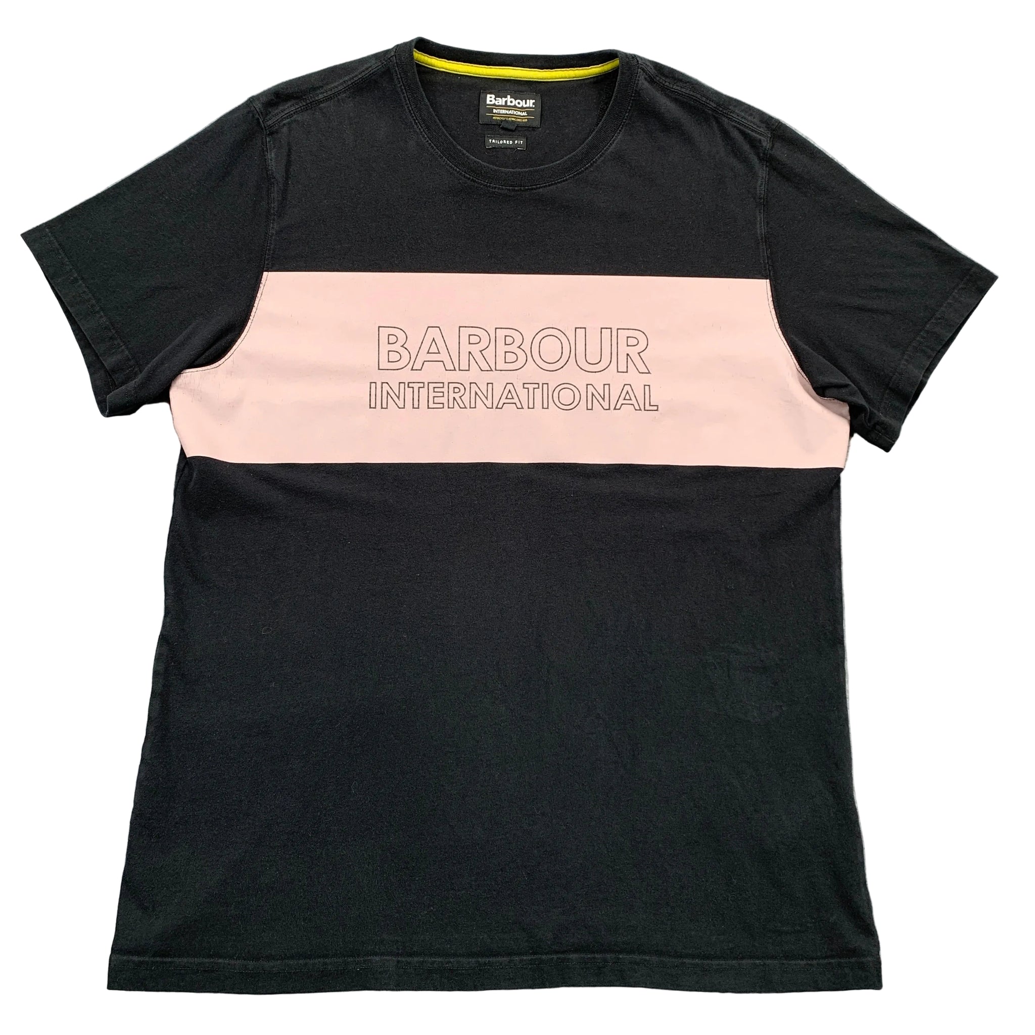 Black and pink t-shirt with Barbour International logo on a gray surface