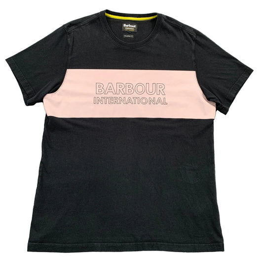 Black and pink t-shirt with Barbour International logo on a gray surface