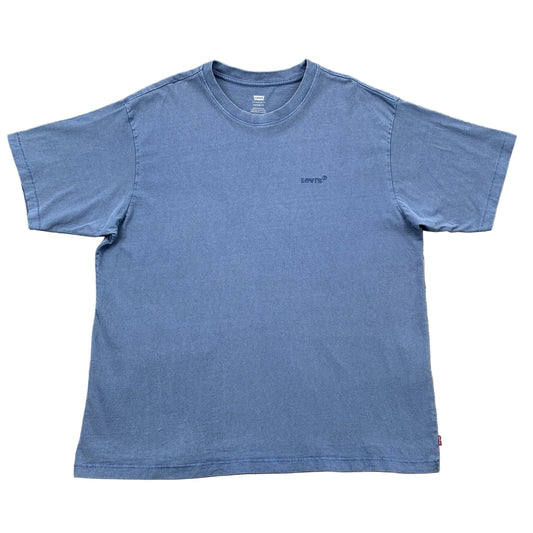 Blue t-shirt with Levi's logo on a gray concrete surface