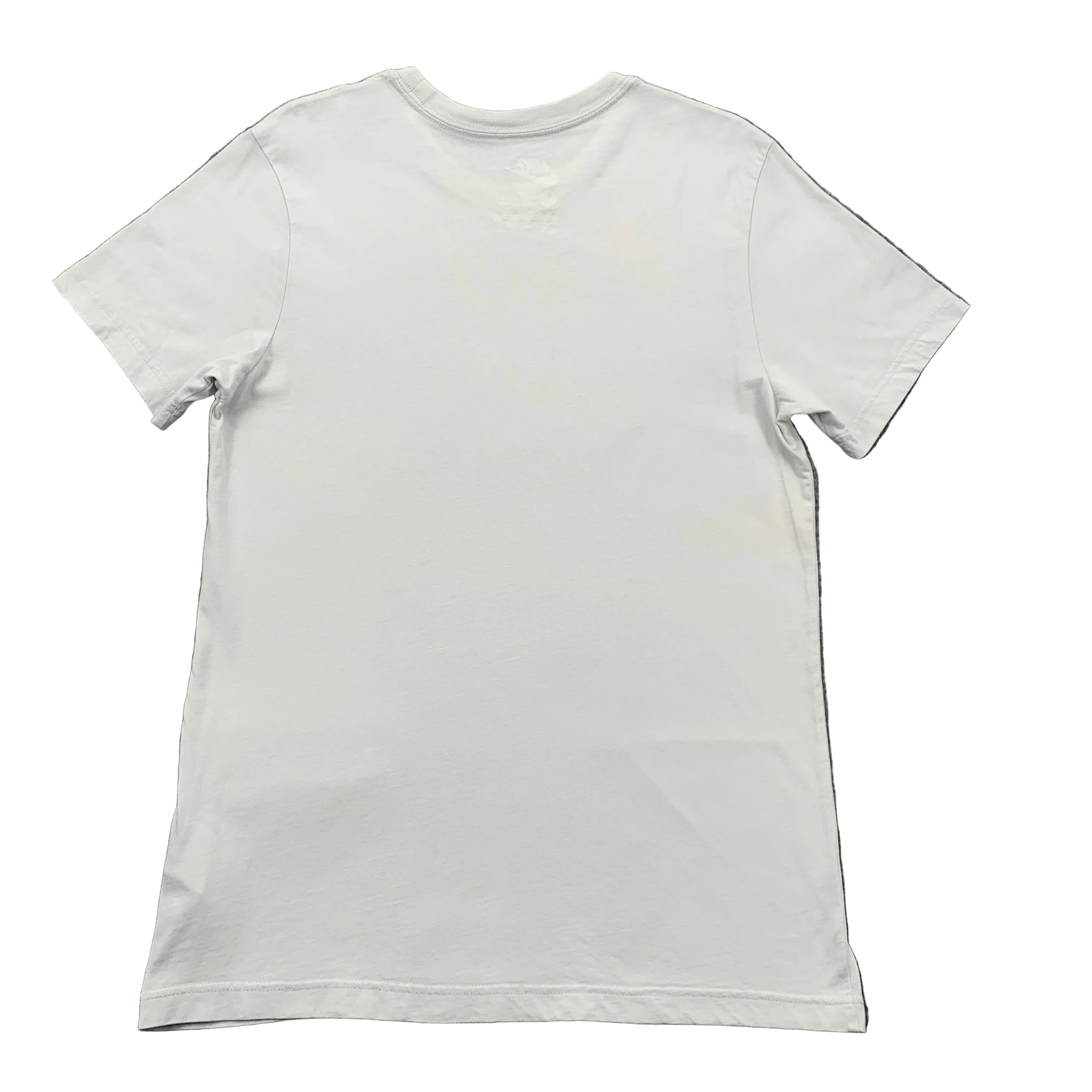 White t-shirt on a gray textured background