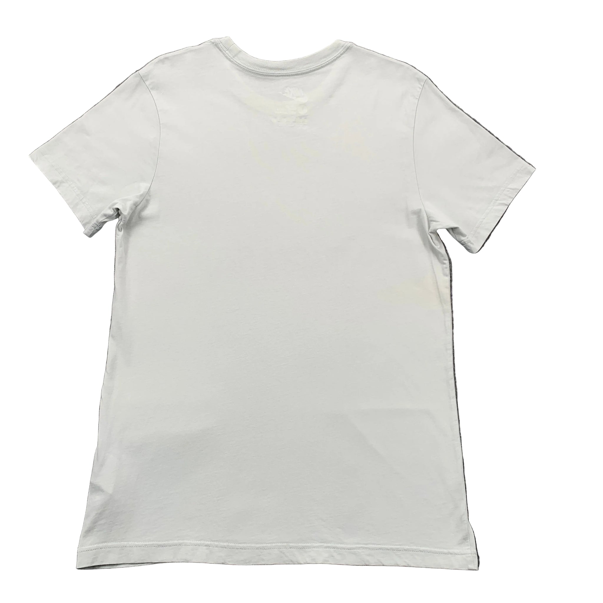 White t-shirt on a gray textured background