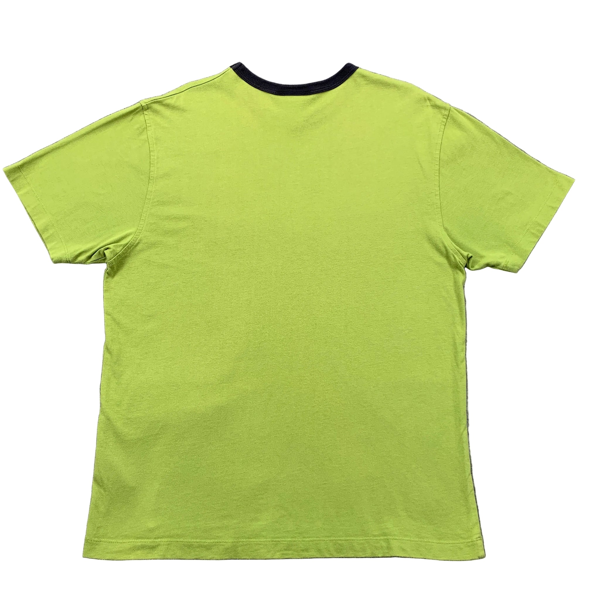 Green t-shirt on a gray textured surface