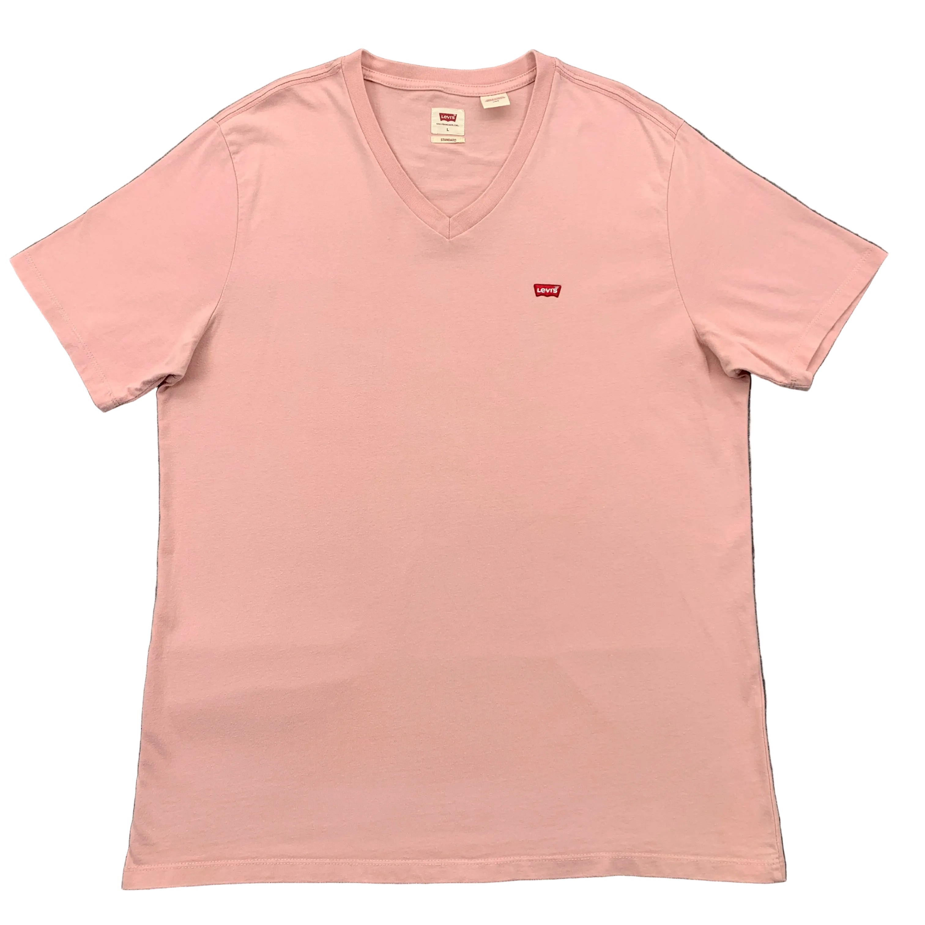 Pink t-shirt with Levi's logo on a gray surface