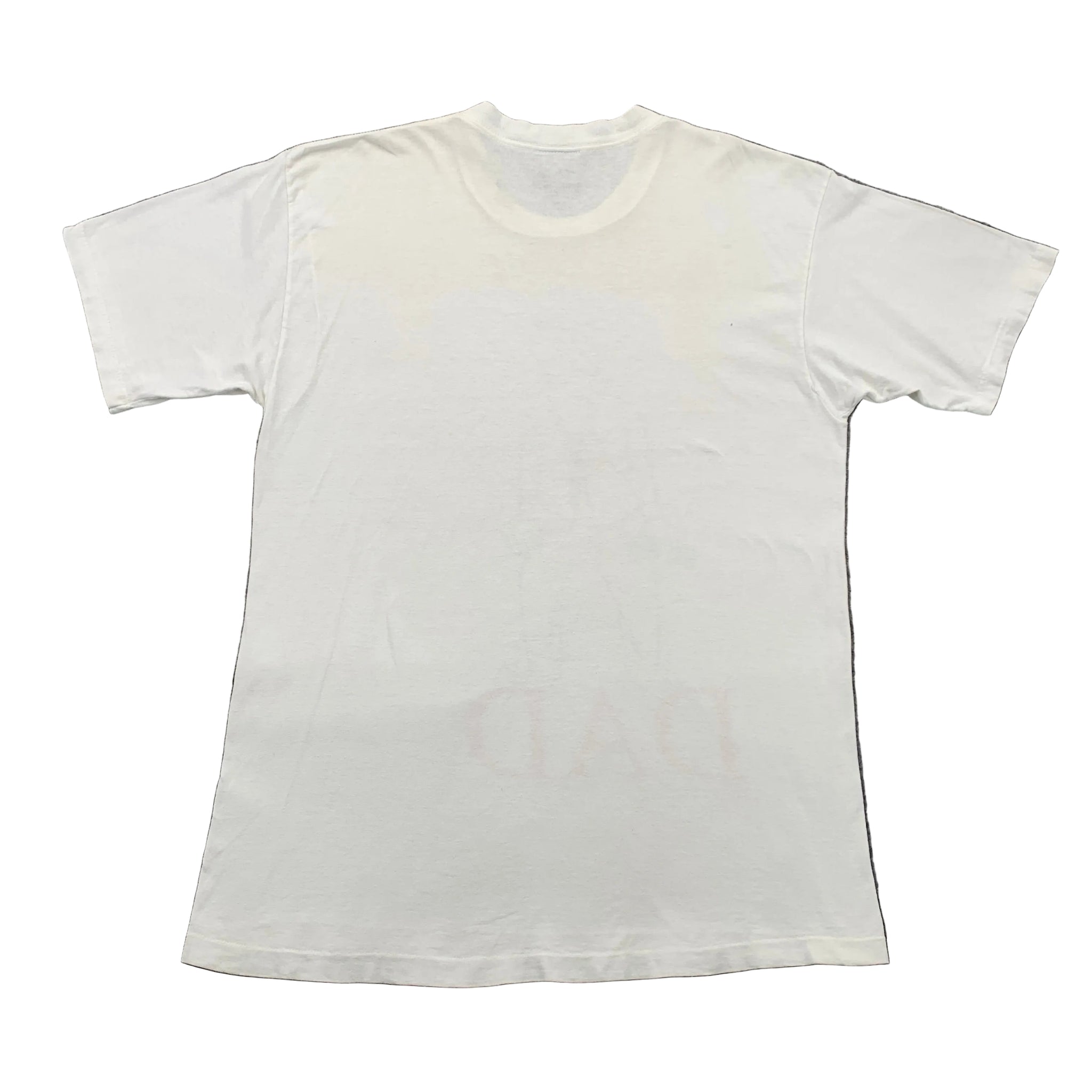 White t-shirt on a gray surface