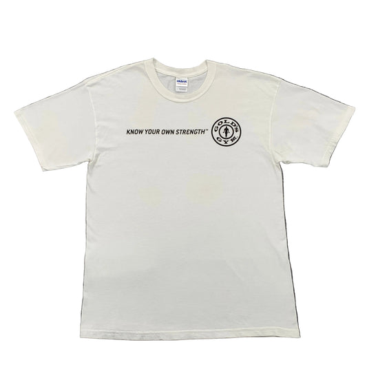 White t-shirt with black text and logo on a gray surface
