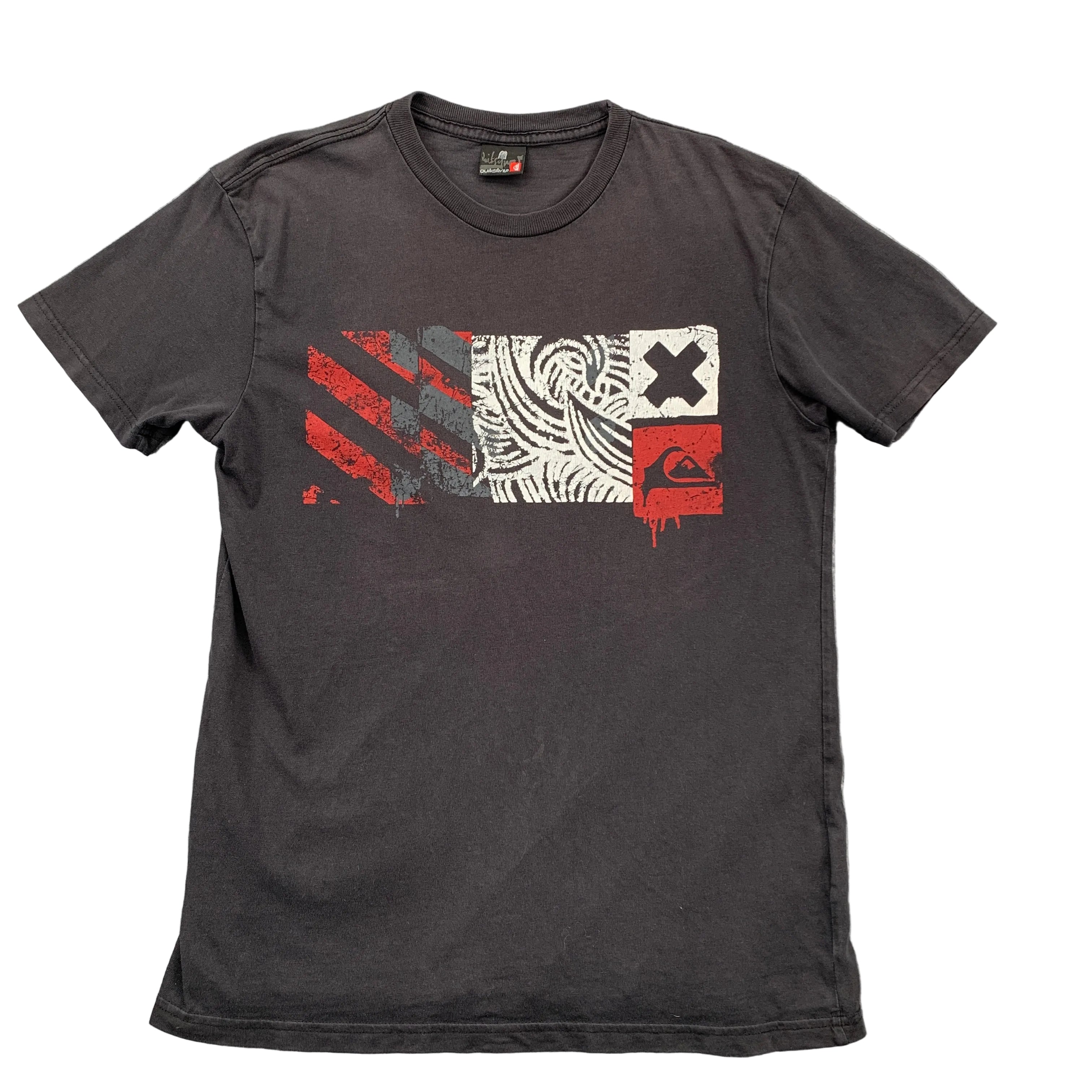 Black t-shirt with graphic design on a gray textured background