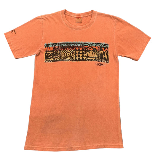 Orange t-shirt with a graphic design on a gray background