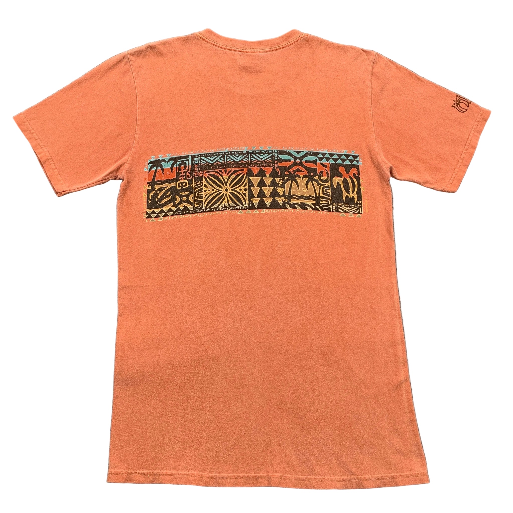 Orange t-shirt with a geometric pattern on the back, laid flat on a gray surface.