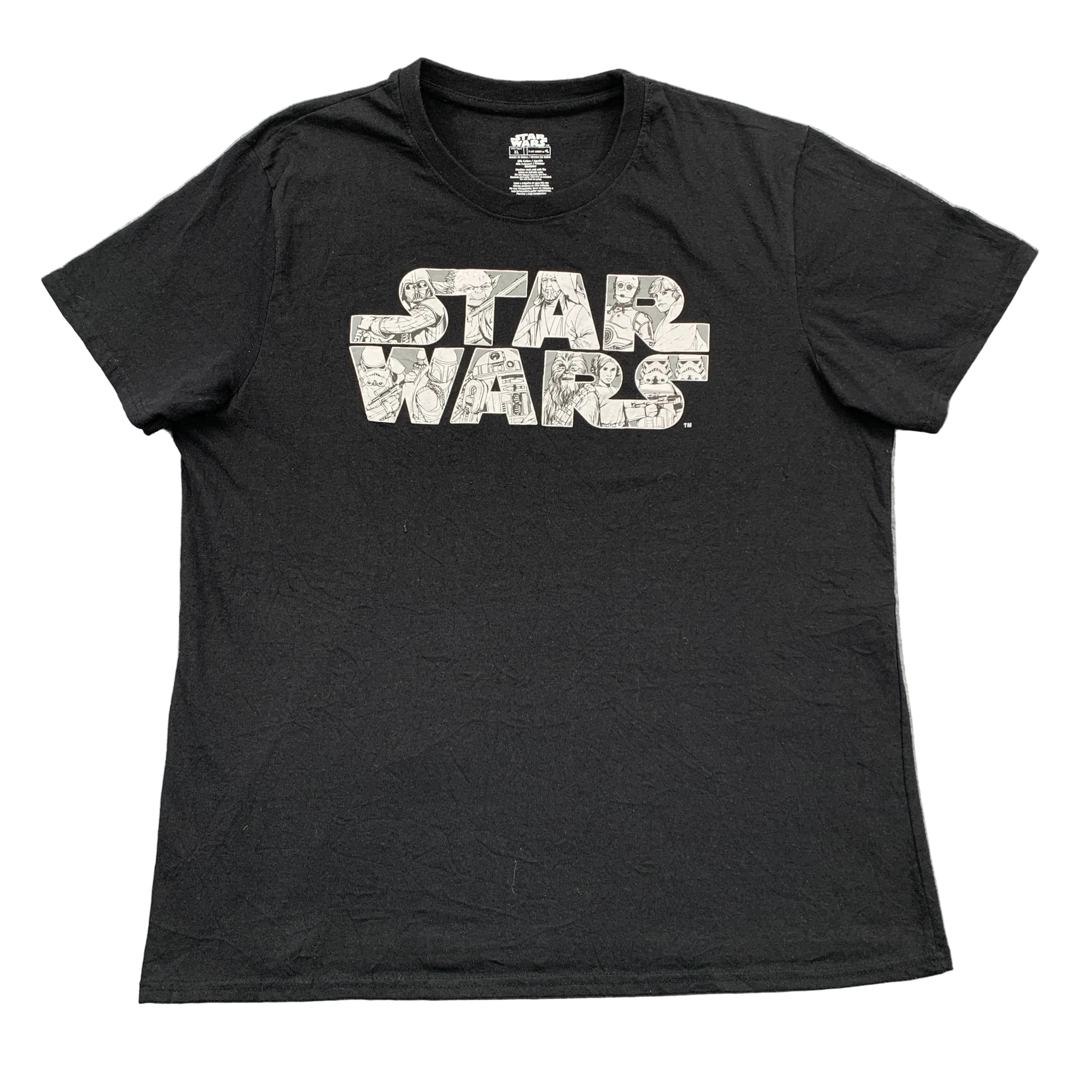 Black t-shirt with 'Star Wars' logo on a gray surface