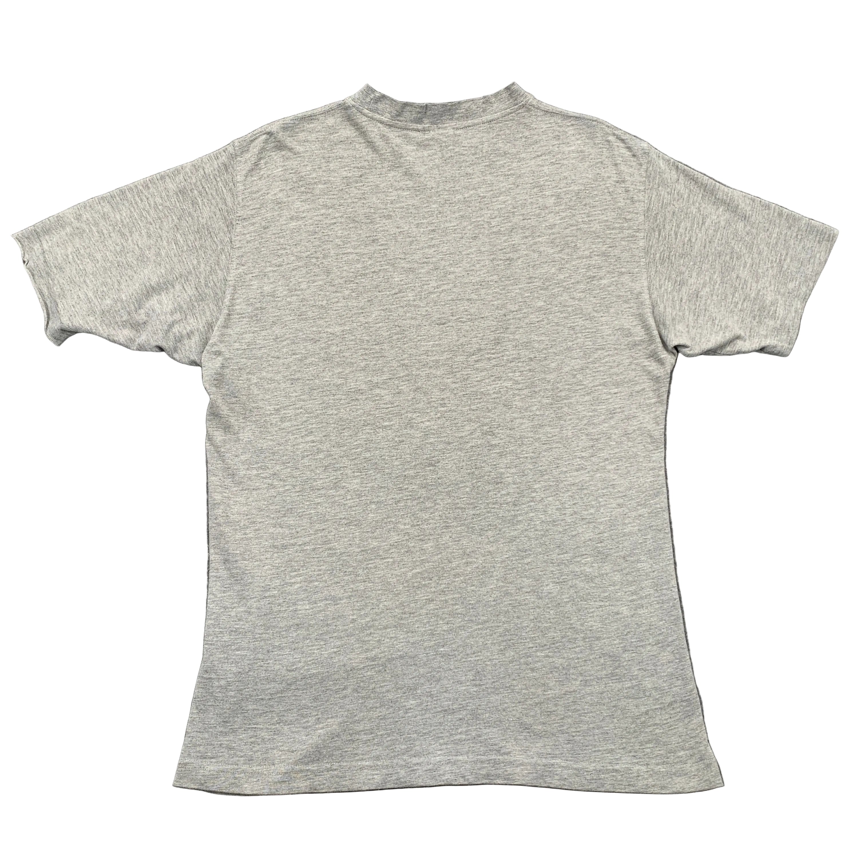 Gray t-shirt on a gray textured background
