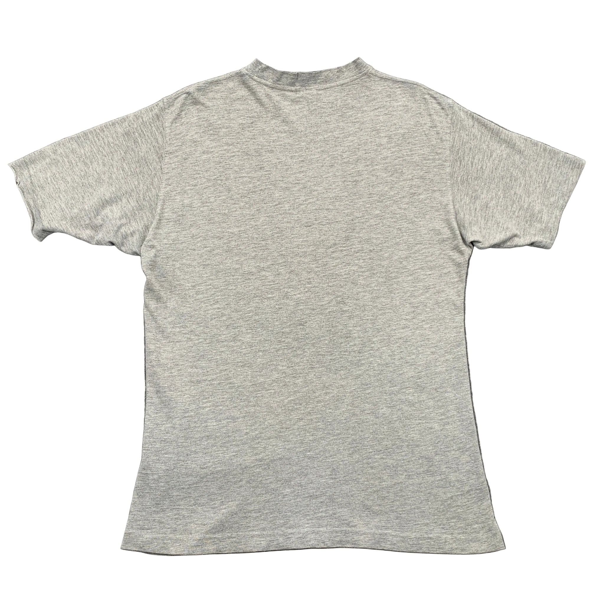 Gray t-shirt on a gray textured background