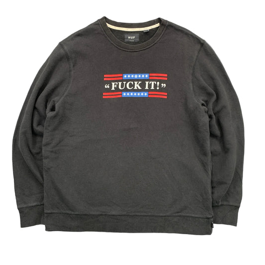 Black sweatshirt with red, white, and blue graphic on a gray background